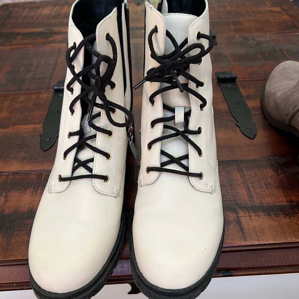White Women’s Cole Hahn Combat Boots.